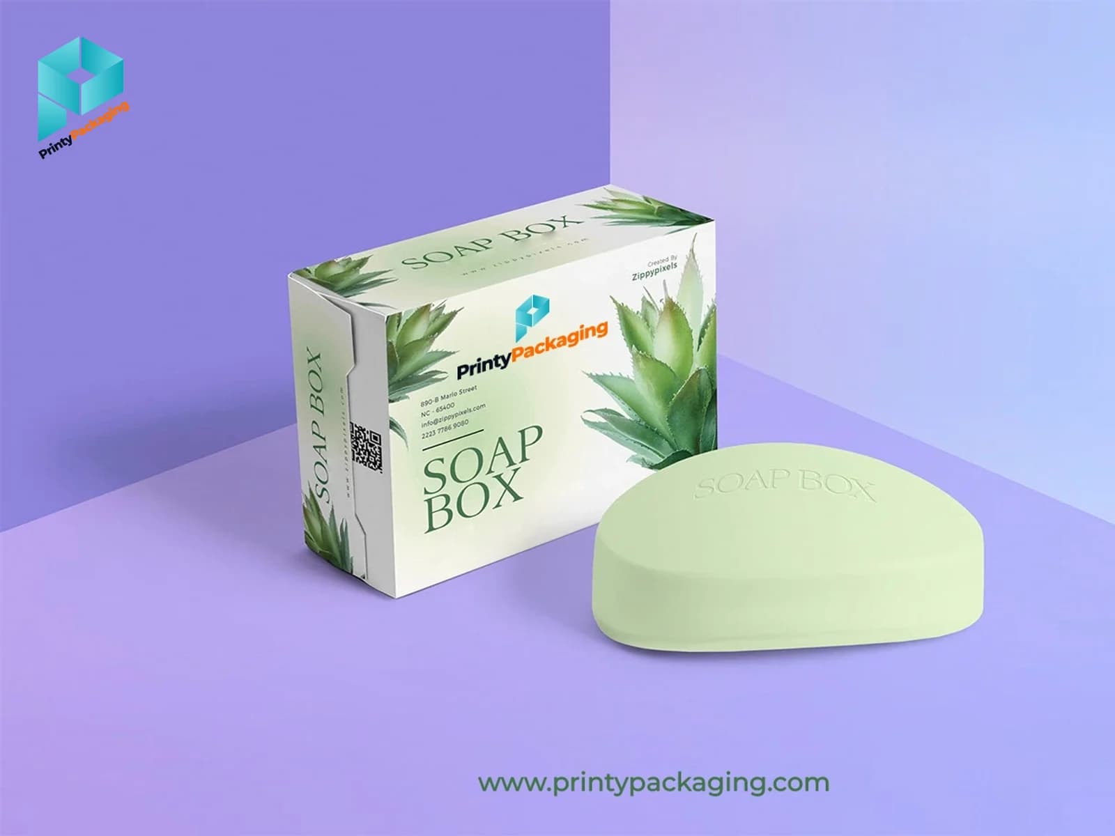 Printed soap box with an aloe design next to a bar of soap
