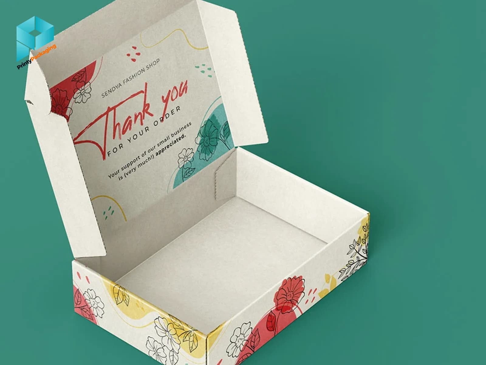 White mailer box with a floral thank you print inside