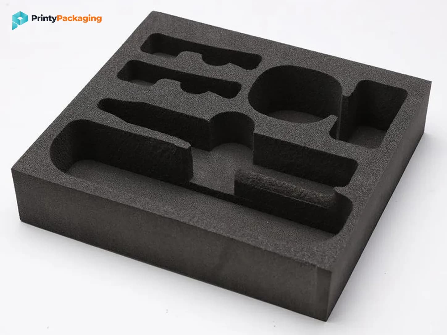 Black foam insert with cut-outs for a product set