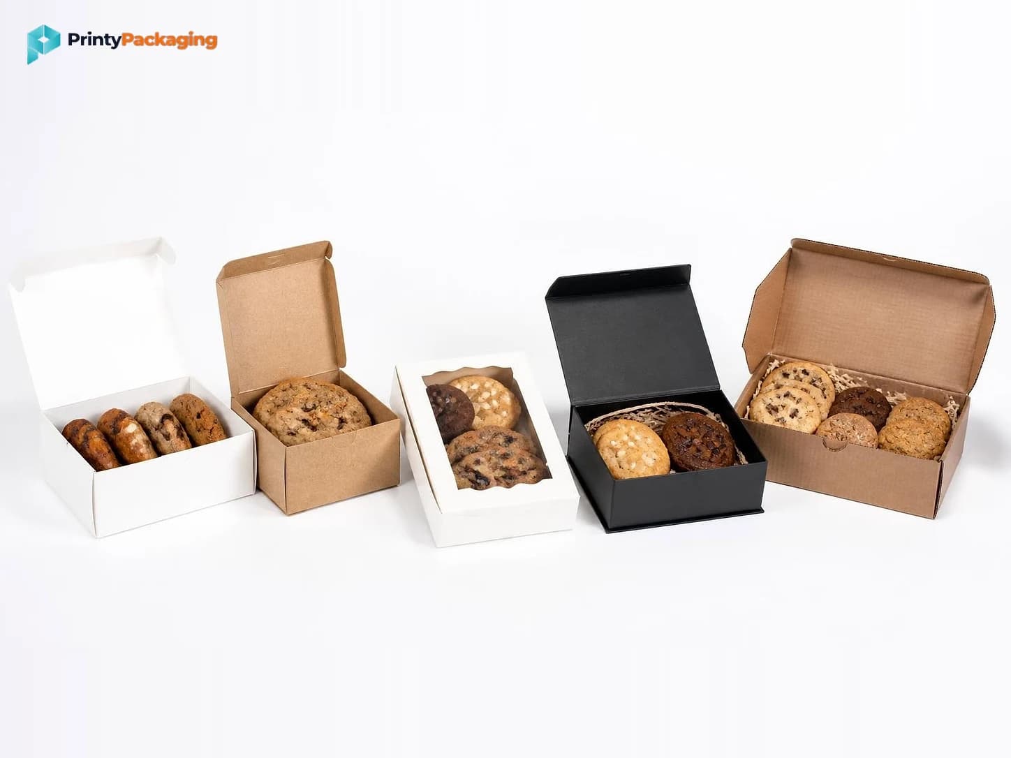 Row of cookie boxes in white, kraft and black, filled with cookies
